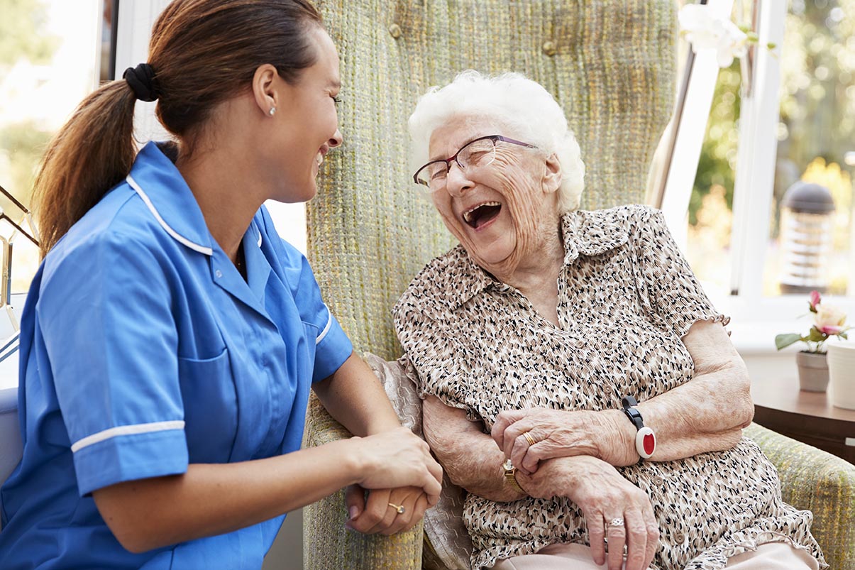 a woman in hospice receiving help from a Paradise Valley care giver
